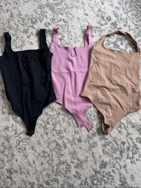 Bundle of Abercrombie Bodysuits in Black, Mauve and Beige